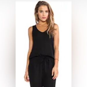NWOT Theory 100% silk jumpsuit from Neiman’s. Great black sleeveless w/pockets